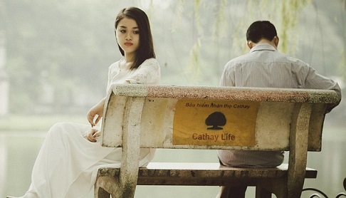 sad lady and man in bench