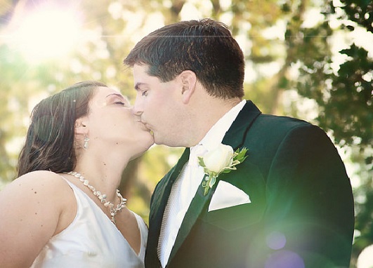 bride and groom kissing