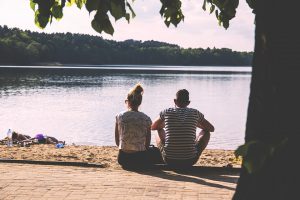 couple by the water