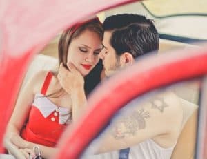 couple conversing in car