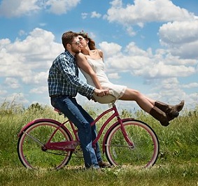 couple riding bicycle