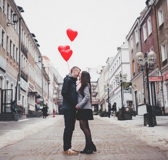 couple with love balloons