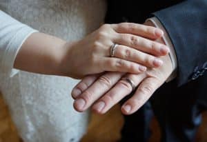 hands with wedding rings