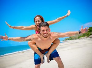 topless man carrying his love