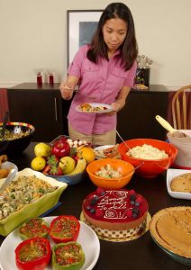 Woman Serving Food