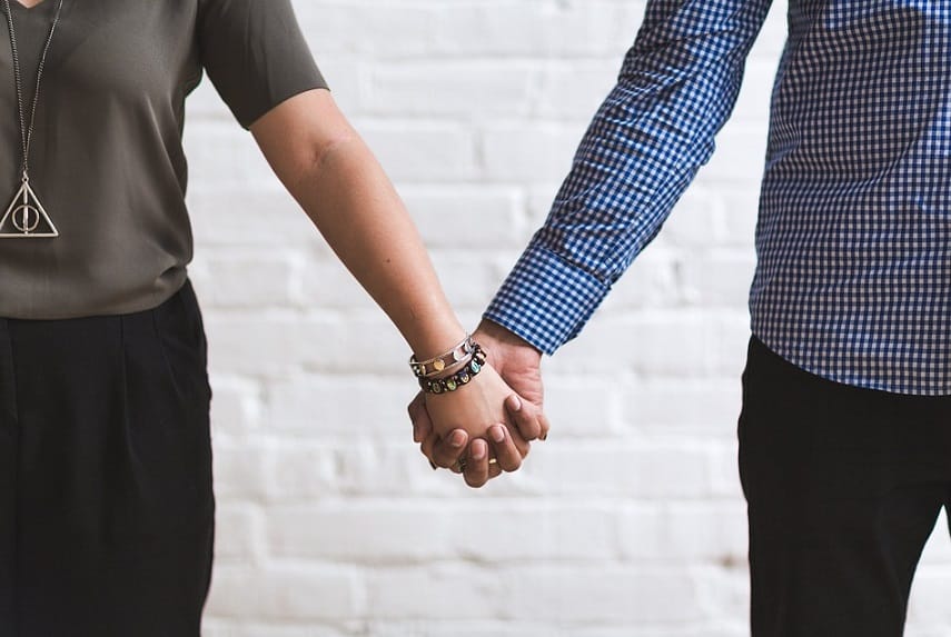 couple hands with bracelets