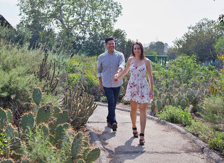 couple walking while holding hands