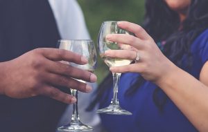 engaged couple celebrating