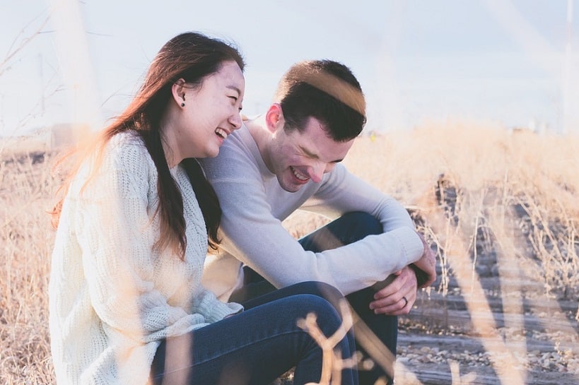 happy couple sitting