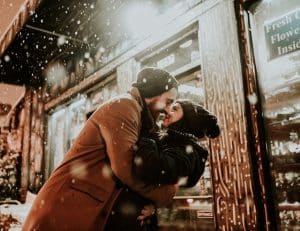 man and woman in the snow