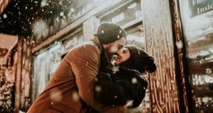 man and woman in the snow