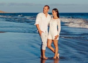 man with his woman in beach