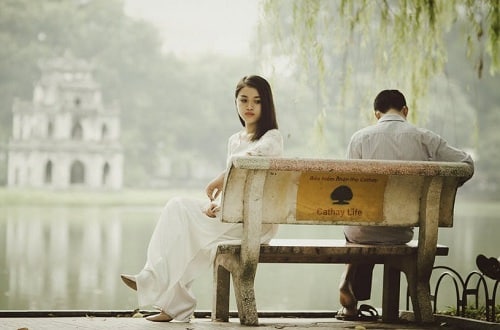 sad couple on a bench